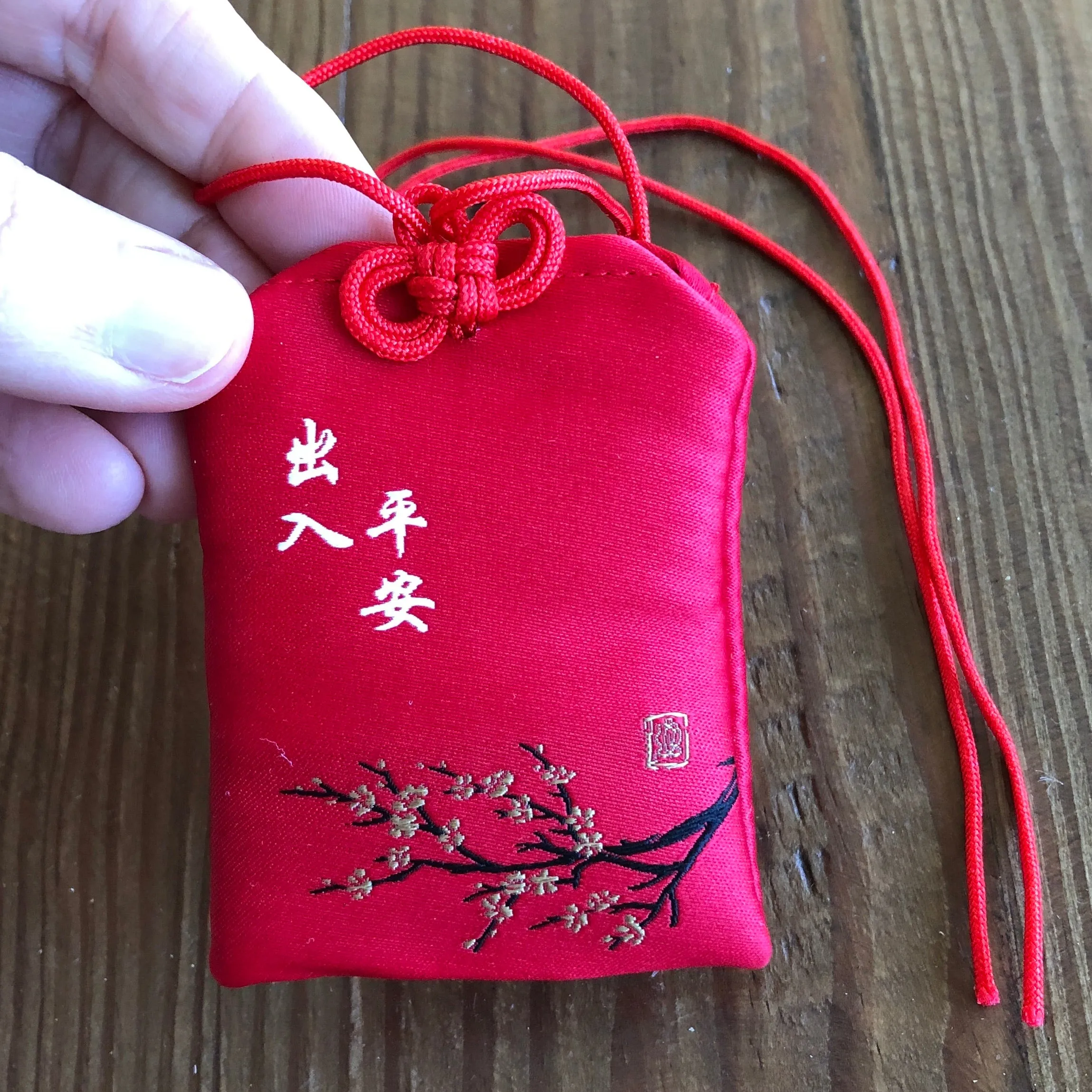 Safety amulet - red cherry blossoms